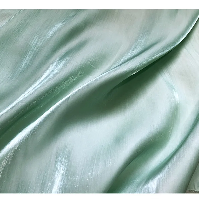 CF566 1meter Solid Light Green Summer Fashion Shiny Stain Fabric Skin-Friendly Silk For Women Dress Crystal Pearl Silky Fabrics