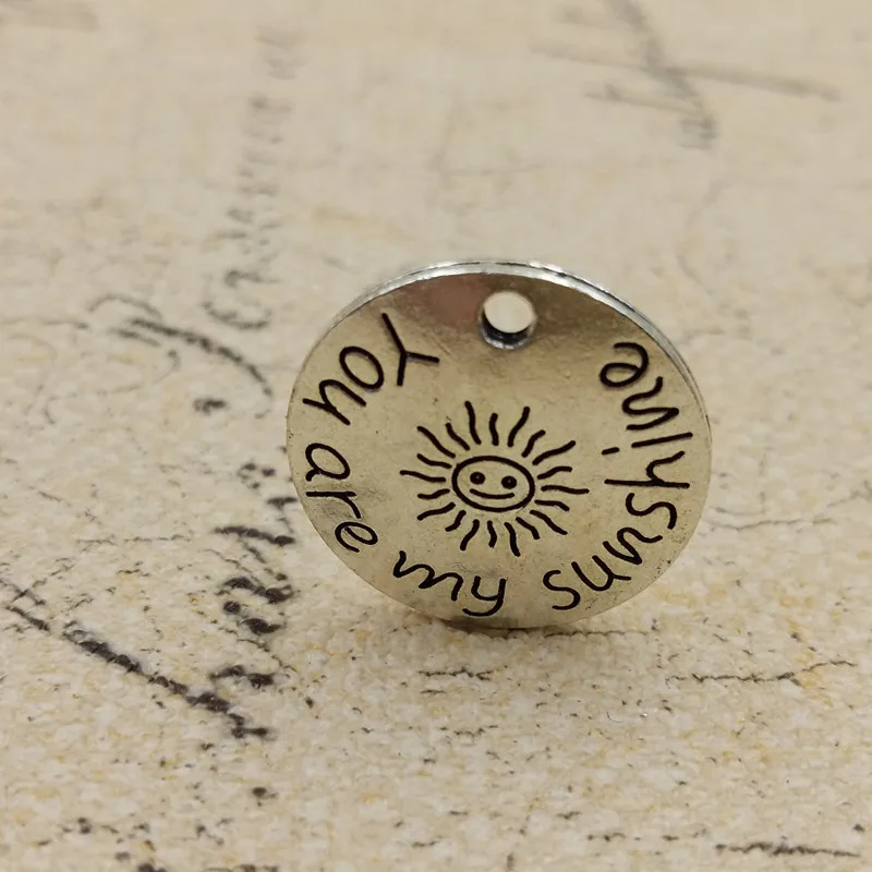 

50pcs/lot Lettering Round tag "You are my sunshine" Letters Carved Charm Pendants 22&28mm For Handcraft DIY Jewelry Findings