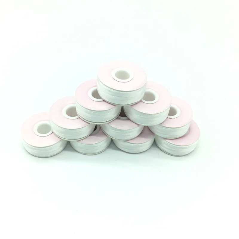 

High Quality 100% polyester paper side bobbin thread 144pcs/box Size L White/ Black 75D/2 Paper side prewound bobbins