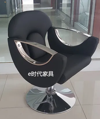 Upscale barber chair. Hairdressing chair.