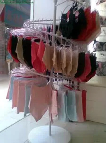 Quality goods bag mail , wrought iron within the rotating racks, display shelf bra console underwear underwear rack shelf