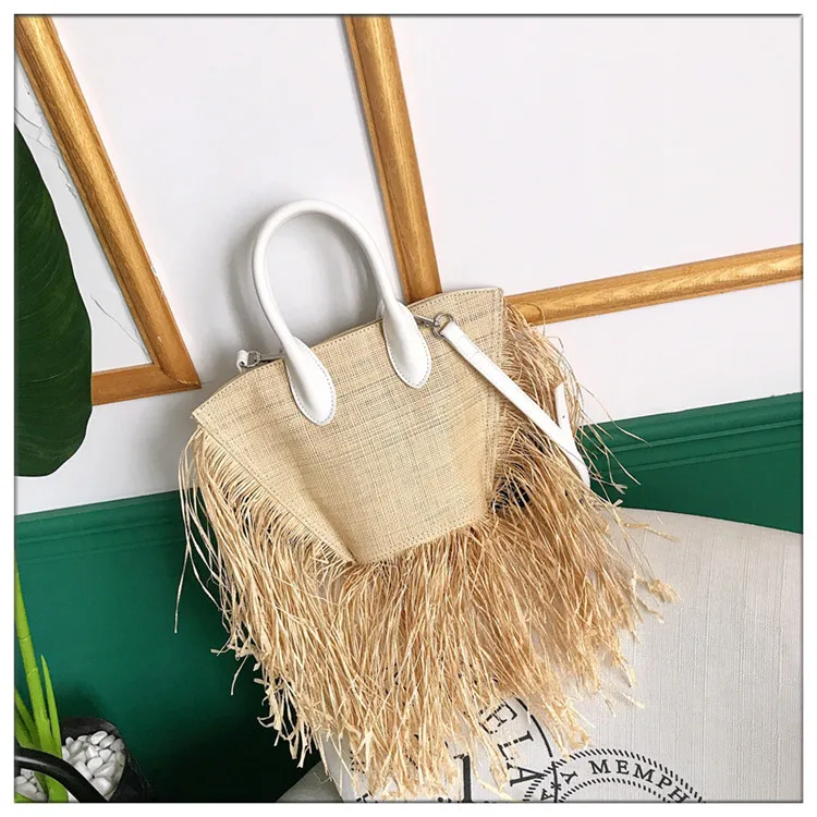 The new raffia woven bag shoulder slanting straw bag 2024 new high quality tassel bag, straw handbag for women,