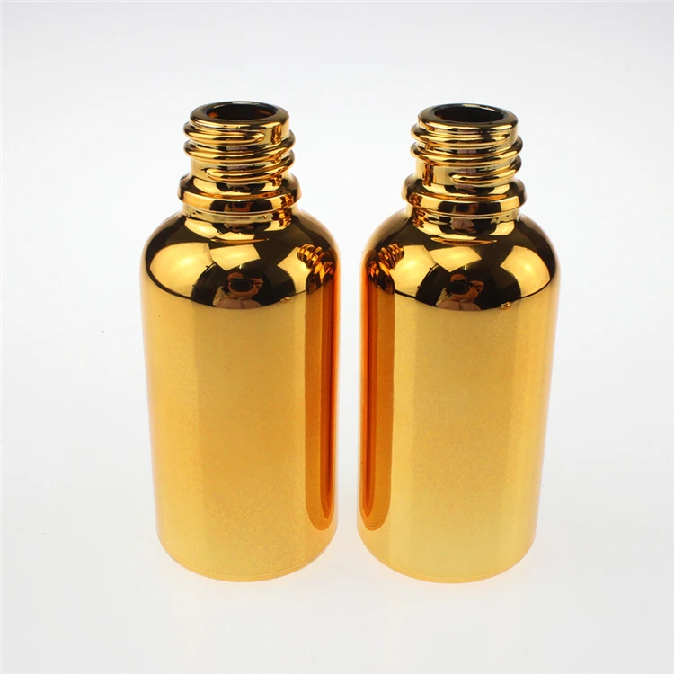 

100PCS Gold dessential oils 30ml glass bottle , wholesale gold 1ounce empty essential oils glass bottles , golden glass bottles