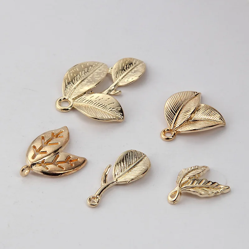 

100pcs High quality DIY Leaf Gold Color Alloy pendant Leaves Charms Metal Bracelet Charm Bride Jewelry accessories