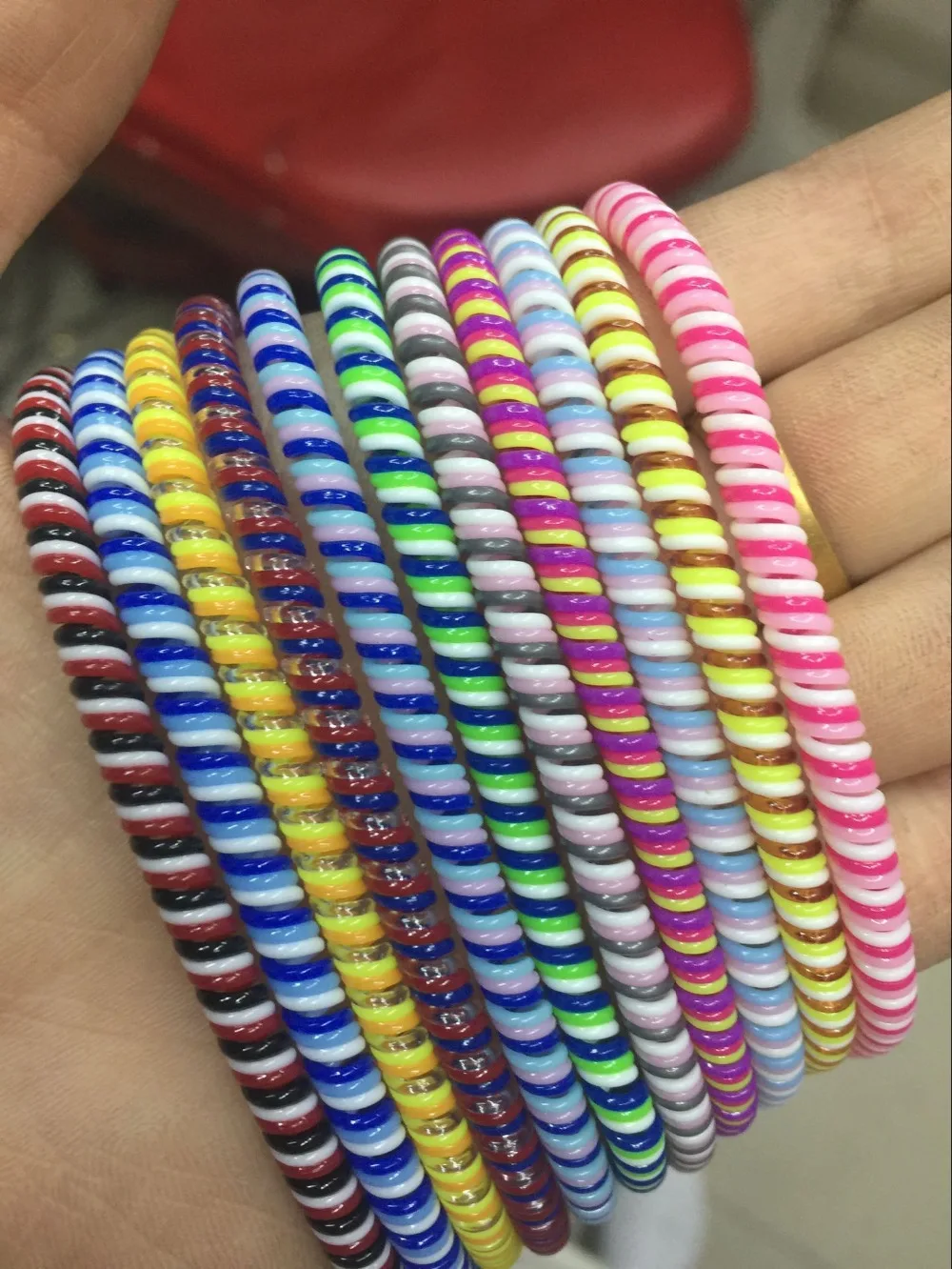 

50pcs/lot Good gift Three Colors Solid Color TPU spiral USB Charger cable cord protector wrap cable winder organizer, Hair ring