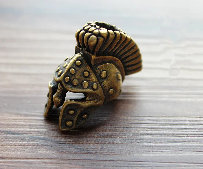 

1 шт. Спартанский Фотофон, латунный нож, бусины, строп, подвесной зонт, трос, голова воина, карманные инструменты для повседневного использования