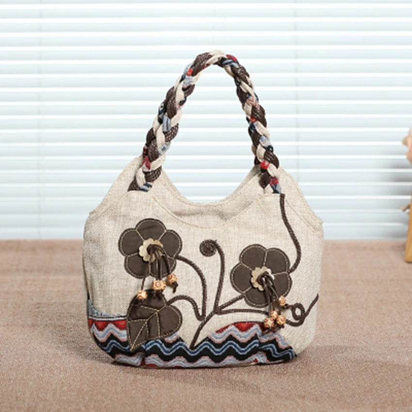 

Hand-woven multi-layer portable cotton and linen blended fabric national wind light and durable handbag travel vacation