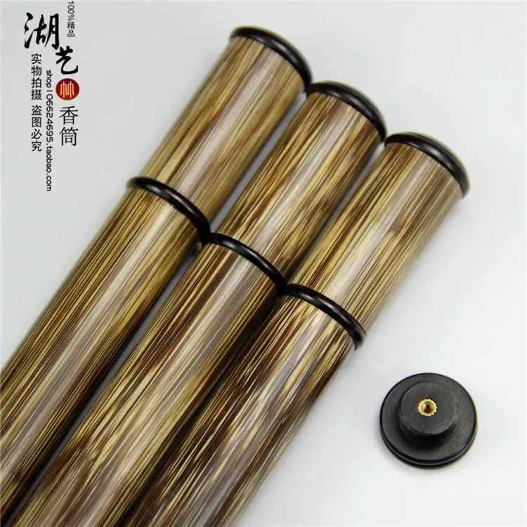 Delicate gold silk and ebony brief paragraph with inserted joss stick cylinder aloes lie sweet fume sweet sweet incense box tube