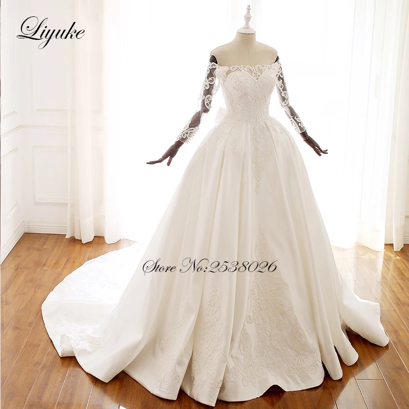 Liyuke Customize Made Beautiful Lace A-Line Wedding Dresses With Off The Shoulder Sleeve Button Closure Wedding Gown