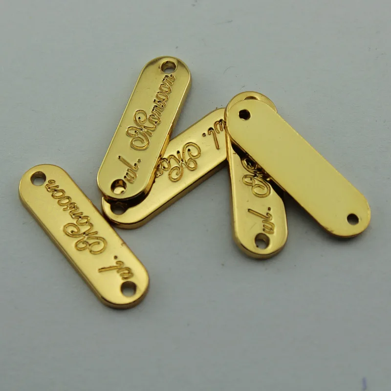 (100pcs/pack) shiny golden electroplating tiny metal tags, labels with customized engraved brand logo for women's clothes