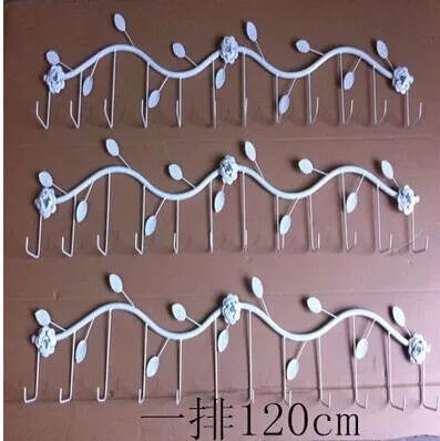 

Wrought iron socks display clothing store shelves Children hang stockings stockings socks hanging on the wall frame