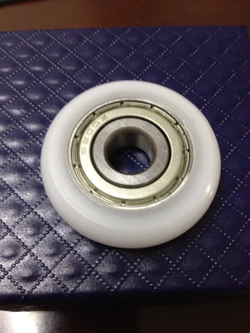 

high quality polyformaldehyde POM coated ball bearings 6200zz embedded bearing outside type:Sphere Total Diamater: 10*40*10mm