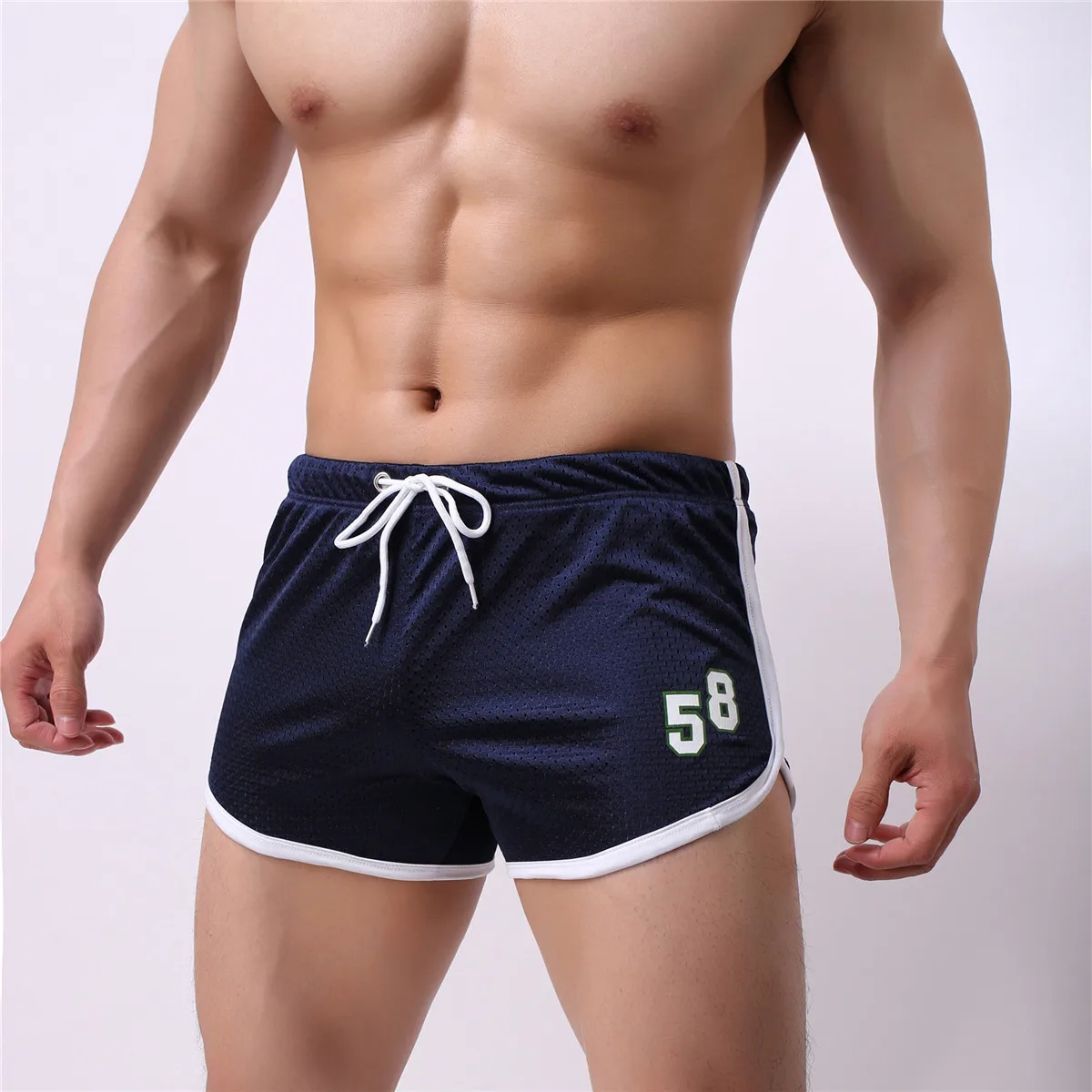 Sport man Summer men\'s sporting shorts men casual hot pants breathless baggy track shorts youth fast dry arrow pants