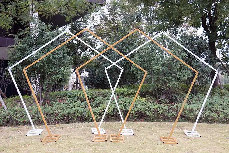 

New wedding props iron art pentagonal frame geometric arch sen department wedding stage background decoration flowers.