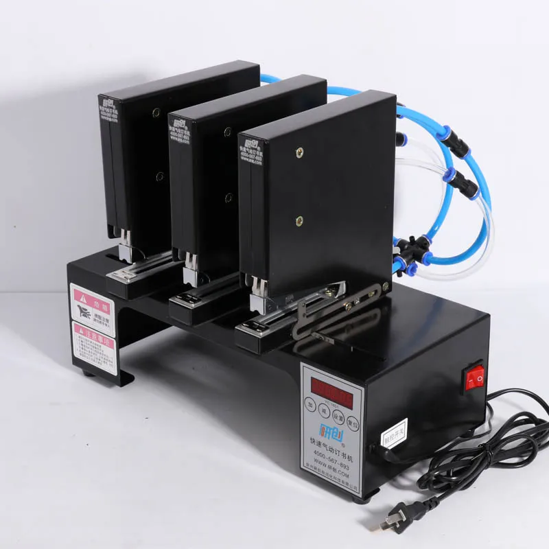 ماكينة تجليد الكتب ذات الدباسة الهوائية ثلاثية الرؤوس ماكينة تجليد الدباسة الكهربائية الأوتوماتيكية ماكينة تسمير مع 180 مرة/دقيقة