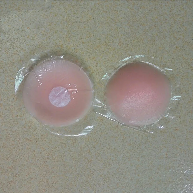 Las mujeres reutilizable cubierta de pezón Auto adhesivo empanadas de mama de silicona etiqueta encanto Bra Pad cubre pezones Sexy