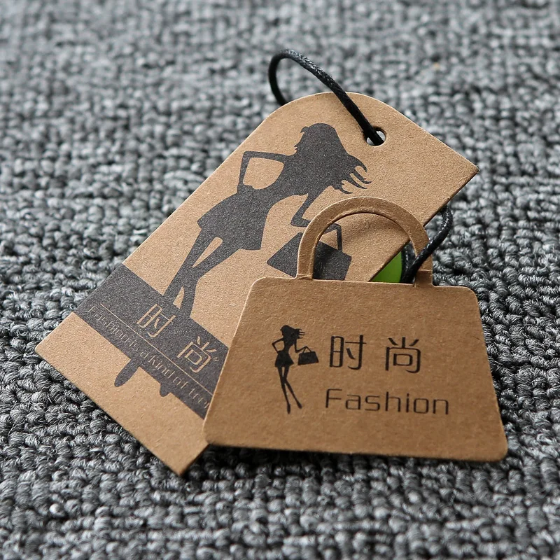 Kraft paper hollow out embossing process OEM clothing trademark custom jewel paper hang tag with logo