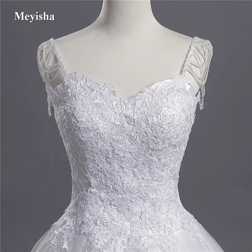 Imagen 1 del producto Personalizado ZJ9041 2025 encaje tirantes espagueti perlas blanco marfil vestidos de novia atractivos para novias de talla grande Maxi tamaño 2-26W tren