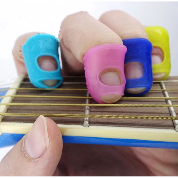 

5pcs Silicone Guitar Thumb Finger Picks Protector Plectrum Fingertip thimble Finger Guard safety protect caps Colors Random