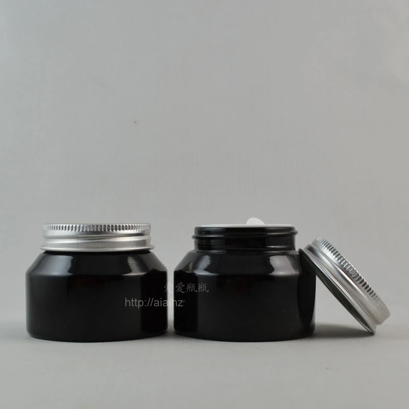 

50pieces High quality 50g shiny black cream jar with silver lid, empty glass cosmetic jar, black 50g glass eye cream jar