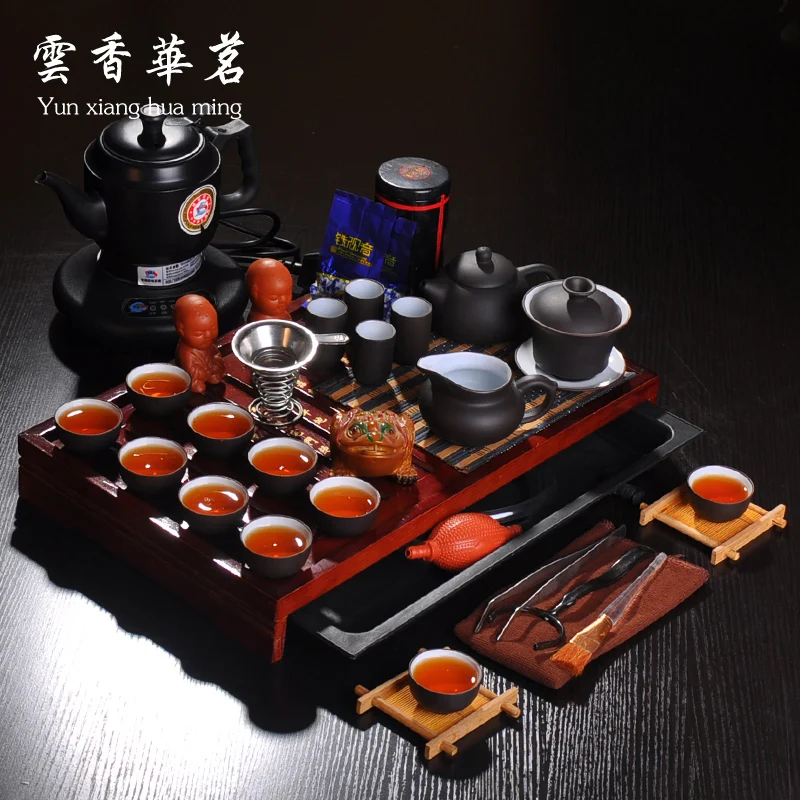 The kettle tea of Purple sand pottery and porcelain tureen tea cozy group Solid wood tea tray tea ceremony