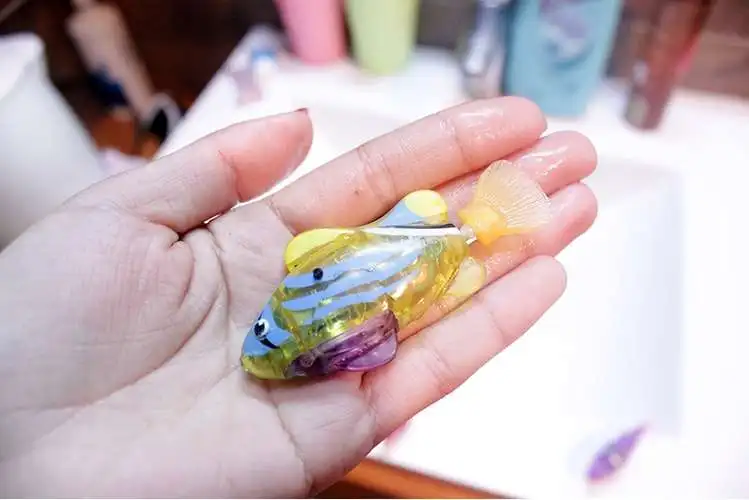 Toy Plastic Sea Life Luminous Electric Electronic Pet Fish Magic Music Fishes Machine Swimming Bath Water Children Toys 2021