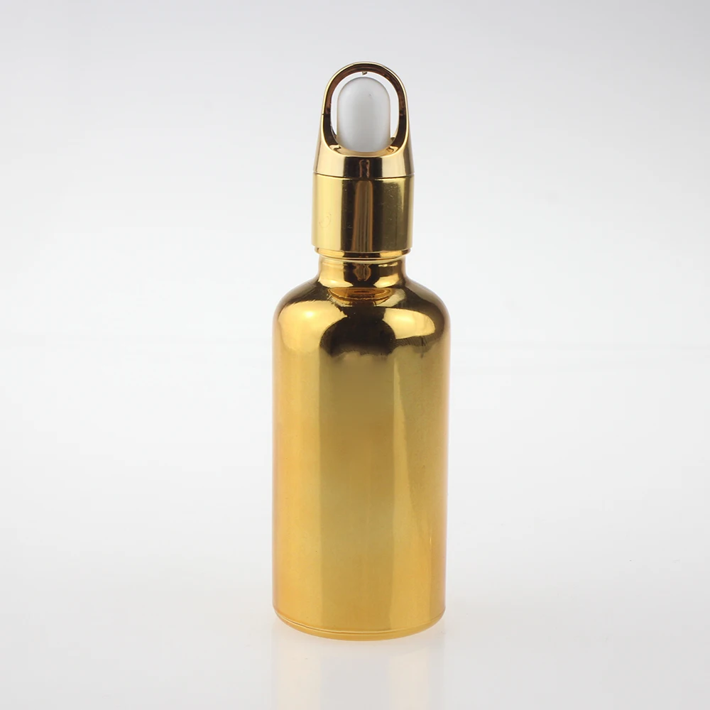 

empty 50ml round gold and silver glass dropper bottle with glass pipette