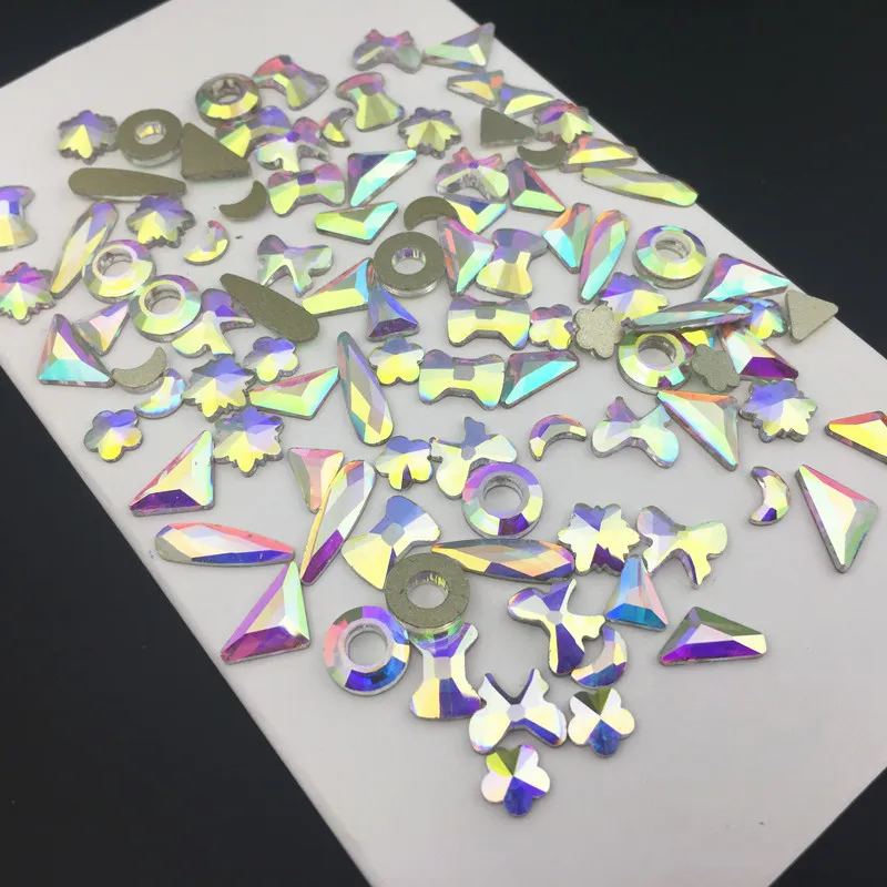 

About 60pcs Crystal Shiny 3D Nail Art Rhinestones AB Colorful Flat Back Mix Shape For DIY Dress Shoes Making