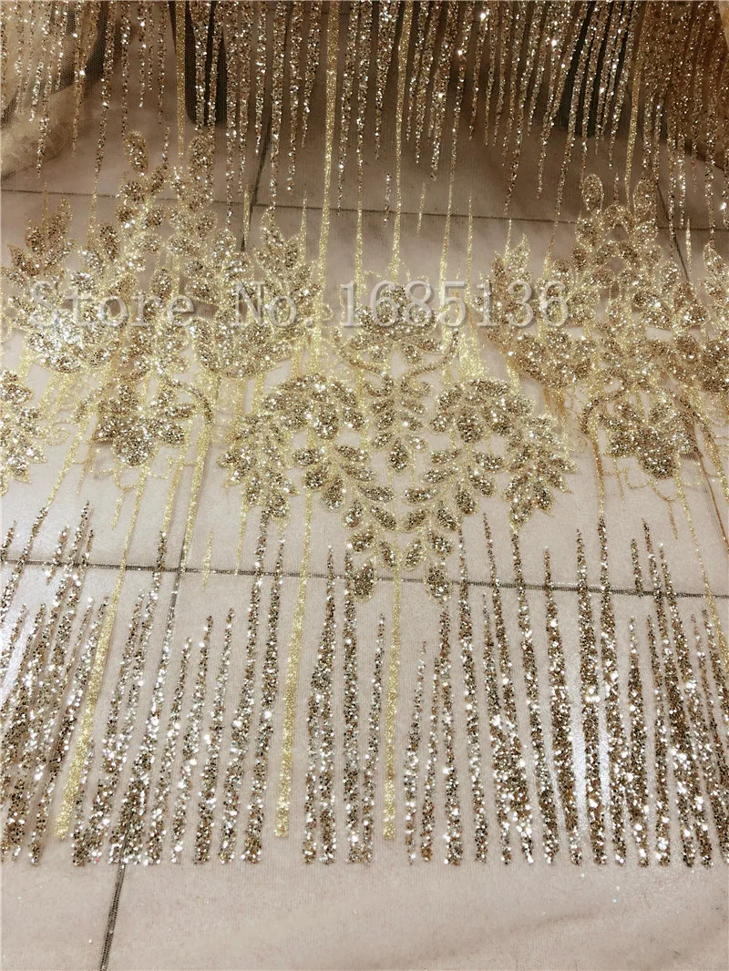 

Pretty design gold color african tulle net lace fabric glued glitter Nigerian tulle lace fabric with beads glued glitter