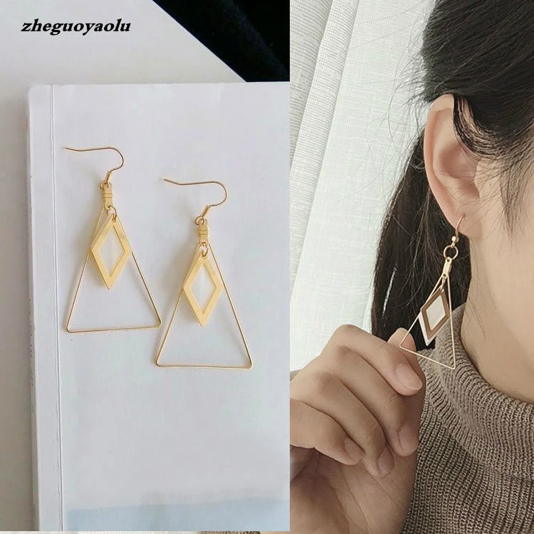 Pendientes geométricos triangulares salvajes para mujer, aretes largos de concha Natural, joyería Original, moda minimalista