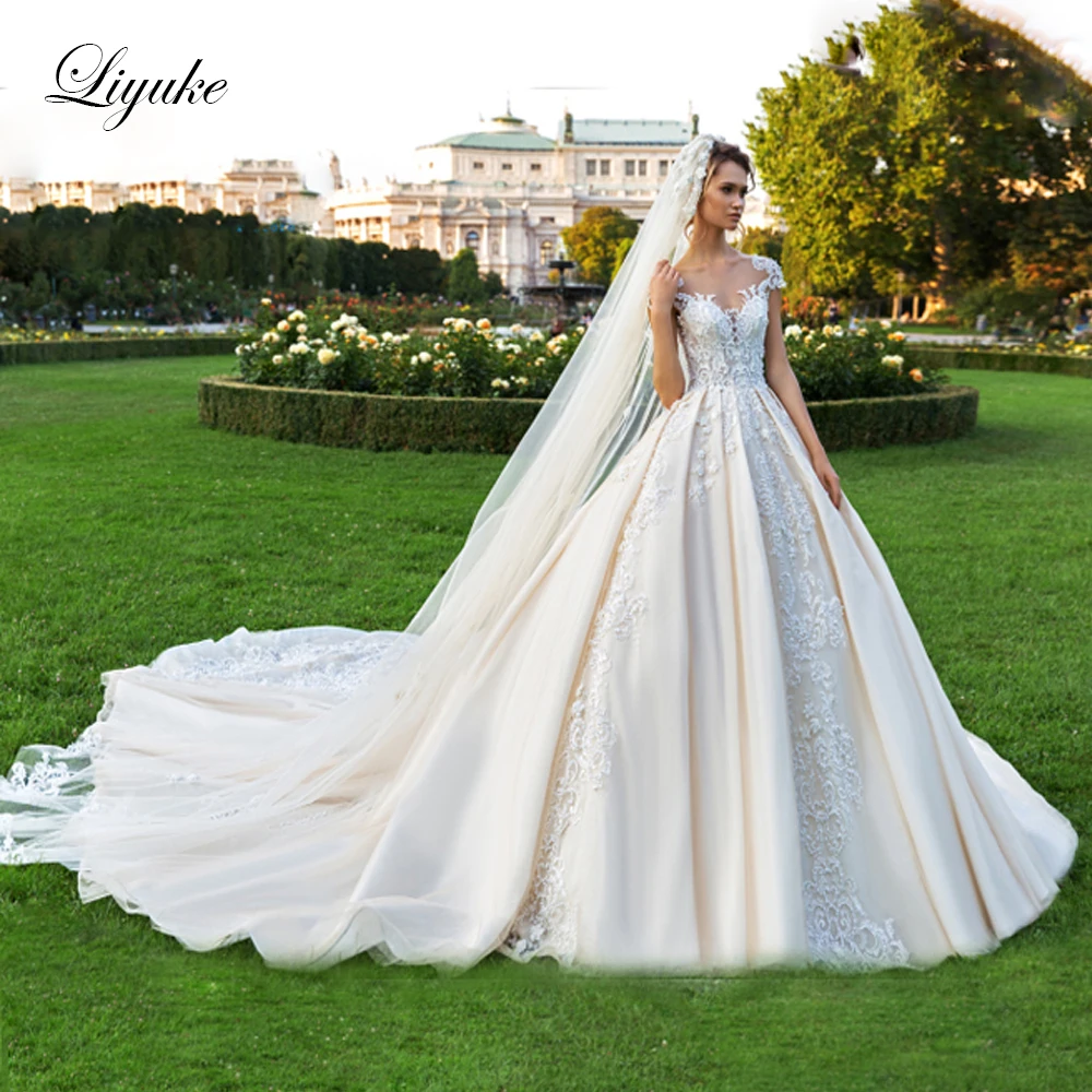 Liyuke Champagne Color Ball Gown Wedding Dress With Elegant Satin And Lace Beading Sewing Buttons