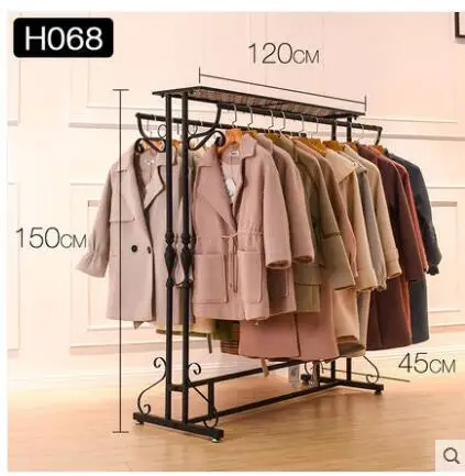 

Clothes shop display rack nakajima double shelf women's clothing store parallel bars hanging clothes rack in the middle .