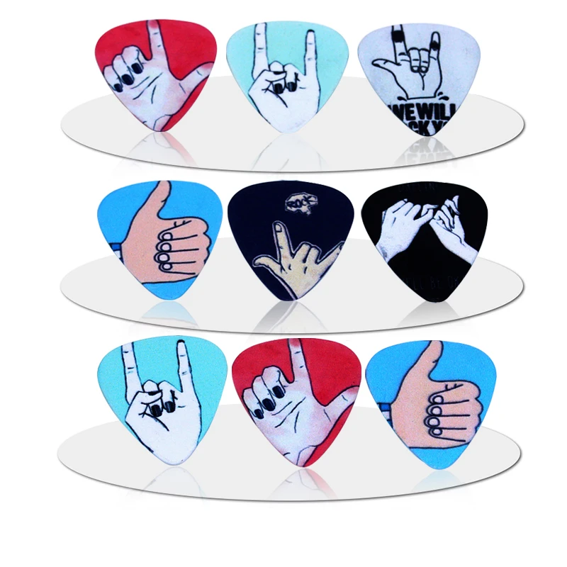 0.71mm / 100pcs bass guitar paddle guitar picks pick pattern plucked instrument accessories bass guitar pick ukulele tool parts