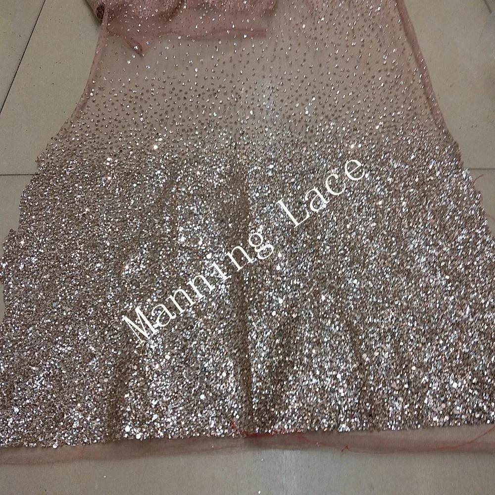 

Elegant surface with glittering leash lace and lace fabric in rose gold color H-85210