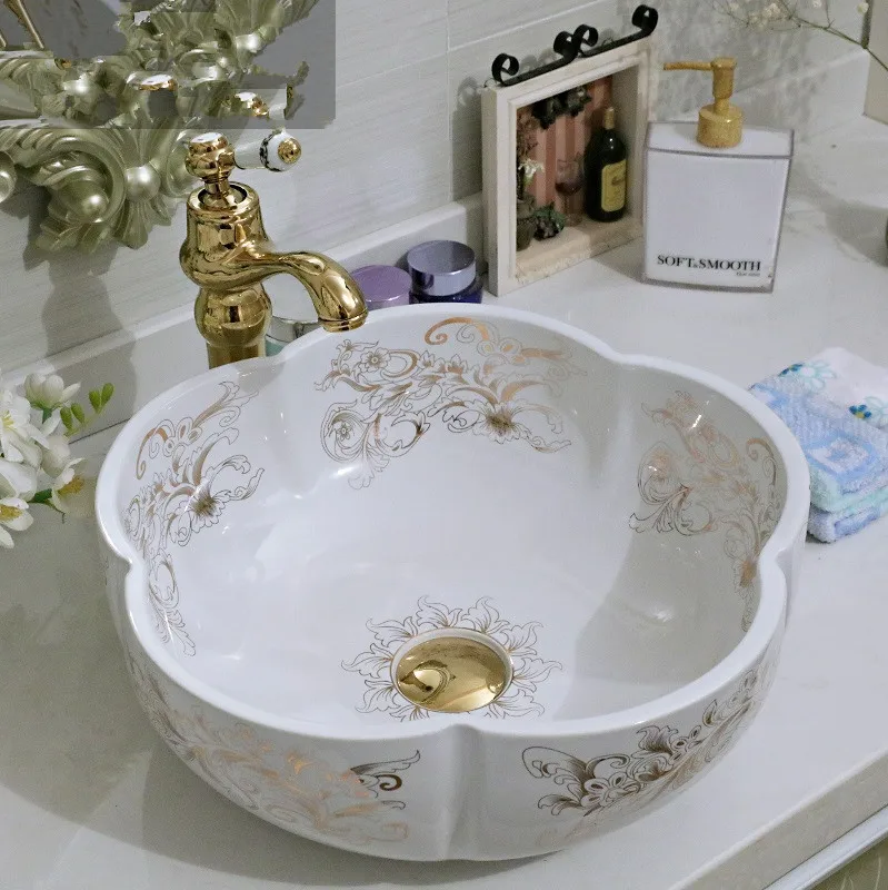 

China Artistic Handmade Ceramic wash basin Lavobo Round Counter top ceramic art wash basin 