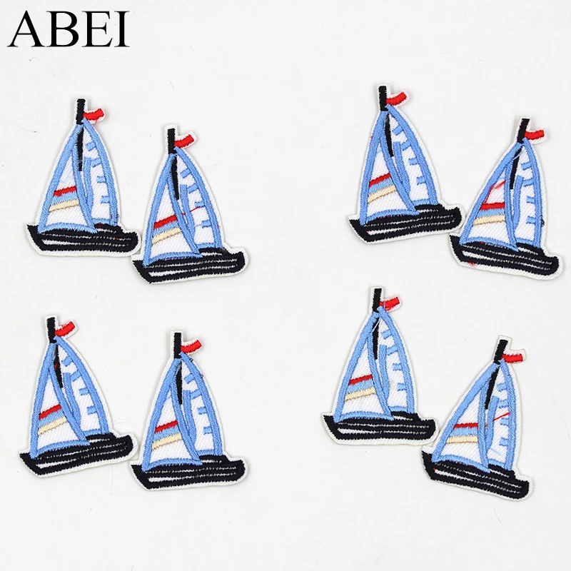 10pcs/lot Cartoon Blue Sailboat Patches Embroidered iron-on Appliqued Kids Apparel Bags Shoes Stickers DIY Patchwork Material