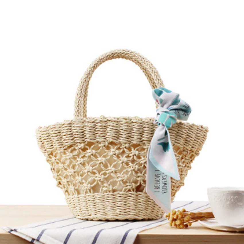 

Europe and the United States wind small hand woven beach bag hollow scarves small fresh straw bag holiday leisure bag