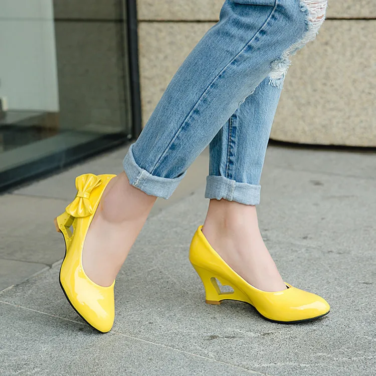 In the spring and autumn season  Bow fashionable candy color patent leather shoes  Hollowed-out wedge size women's shoes 34-43