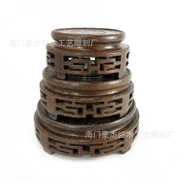 

A set of three wooden jade rosewood base wooden set of three round base solid wooden base