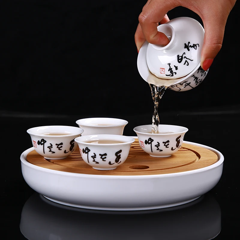 

Travel tea set Portable Chinese Kung Fu Tea Cups [1 Tureen+ 6 Cups] with Bamboo Tea Tray Ceramic Tea Ceremony Table