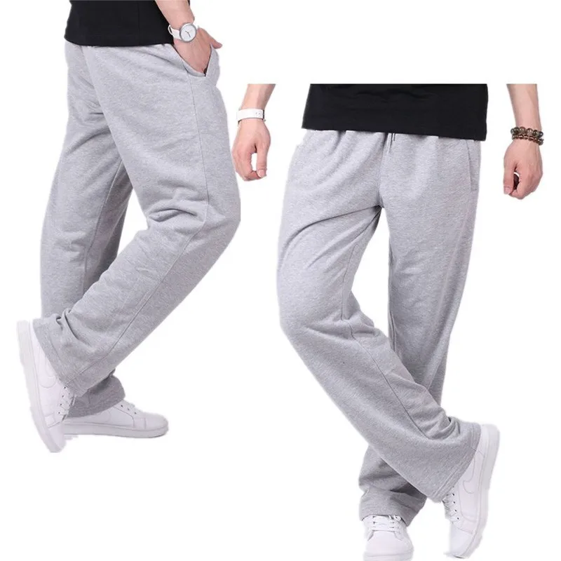 Bahar erkekler artı boyutu pantolon katı Baggy gevşek elastik pantolon pamuk Sweatpants rahat pantolon sonbahar düz pantolon