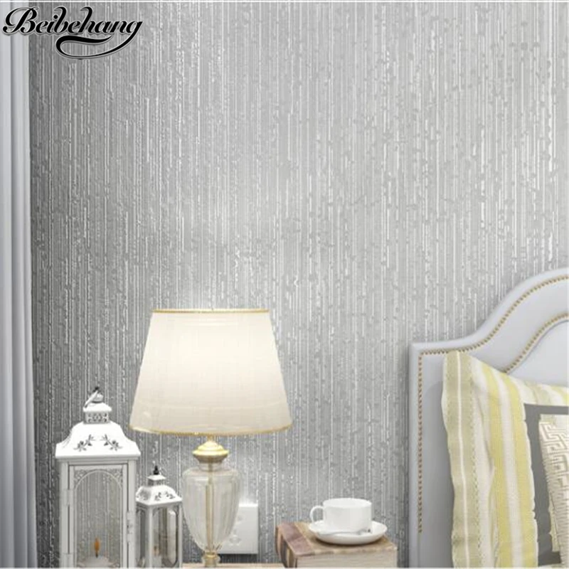 

beibehang Simple modern flocking nonwovens wallpaper warm pure plain vertical stripes living room TV wallpaper papel de parede