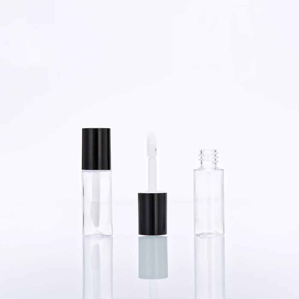 

Clear plastic bottle with black brush tube mini lipstick case