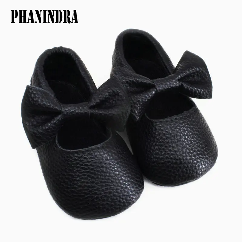 Zapatos de cuero para bebé y niña, mocasines antideslizantes de suela suave plana de PU para primeros pasos, con lazo para recién nacido