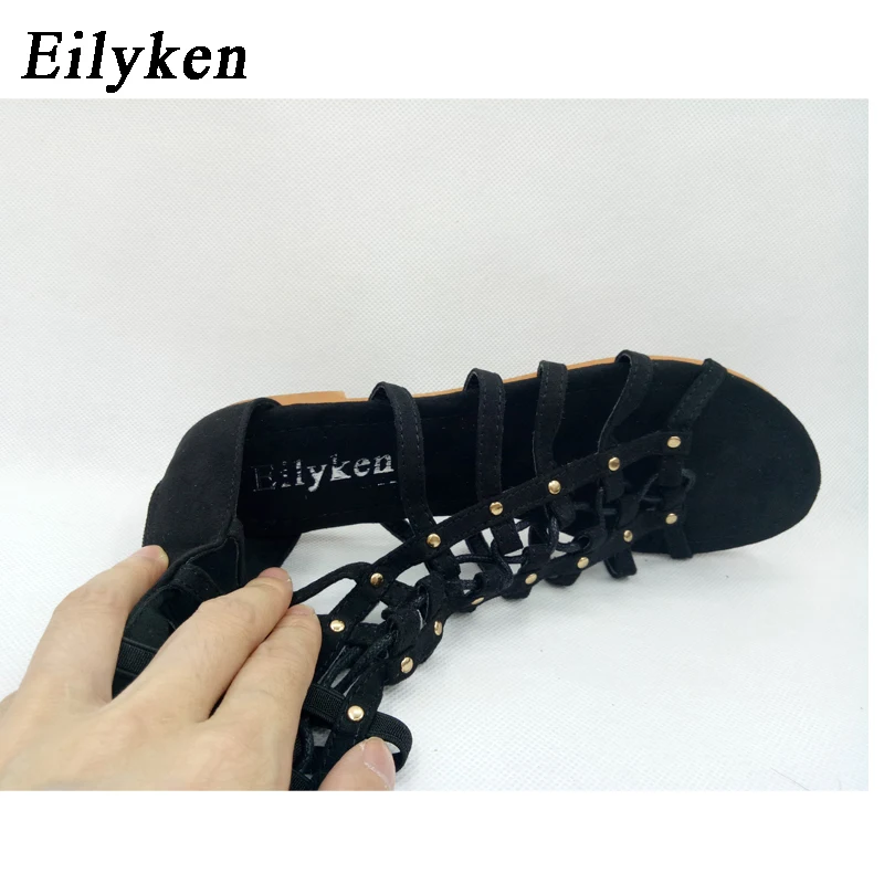 Eilyken Designer sandali da donna Strappy Open toe Knee High Summer Gladiator sandali piatti fasciatura romana stivali Casual scarpe