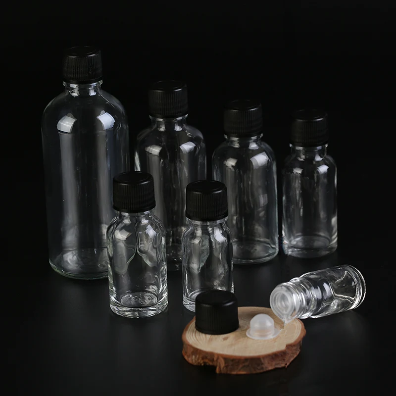 

5ml 10ml Empty clear glass bottle Mini glass Vials essential oil bottle with plastic lids F015