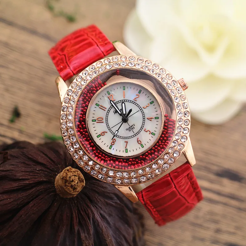 Promotion!Gerryda 753 lady fashion watch,rhinestone deco case with gold plated.Color moving sand stone in case,PVC leather band