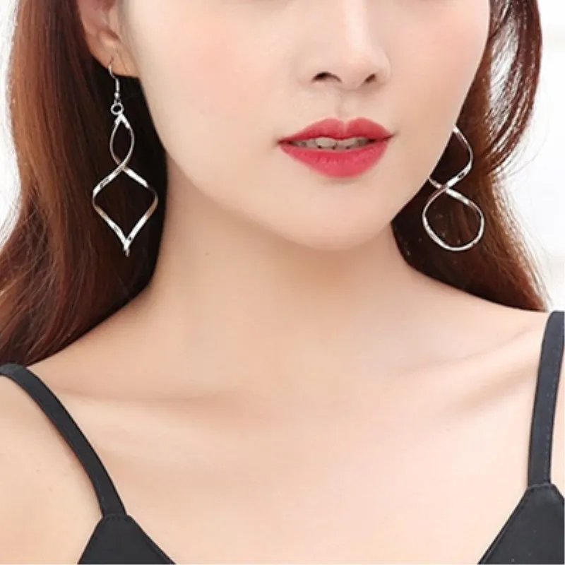 Boucles d\'oreilles pendantes en spirale pour femmes, longue vague incurvée, déclaration de Brincos, bijoux de fête de mariage, mode simple, vente en