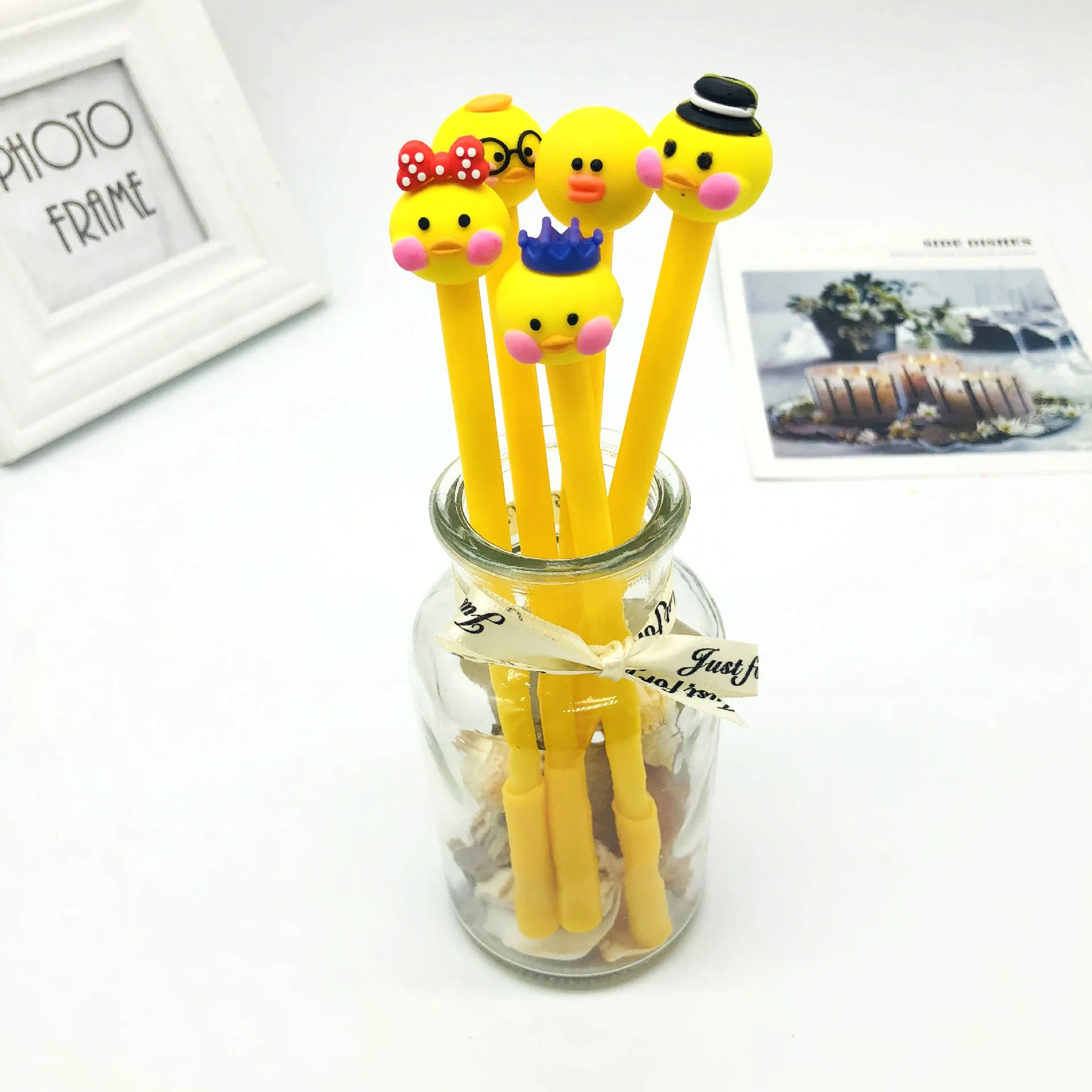 24 pcs wholesale Creative Pvc Soft Gel Yellow Chicken Modeling Neutral Pen Cartoon Rubber Cap Student Kawaii School Supplies