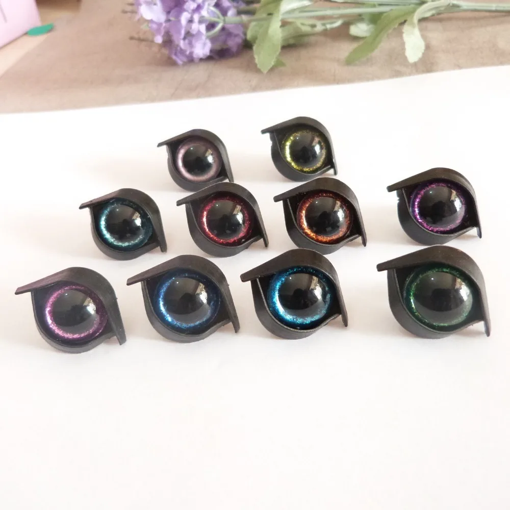 

20set/lot 16mm round shape plastic clear toy eyes +glitter Nonwovens + hard washer+black eyelid--color option